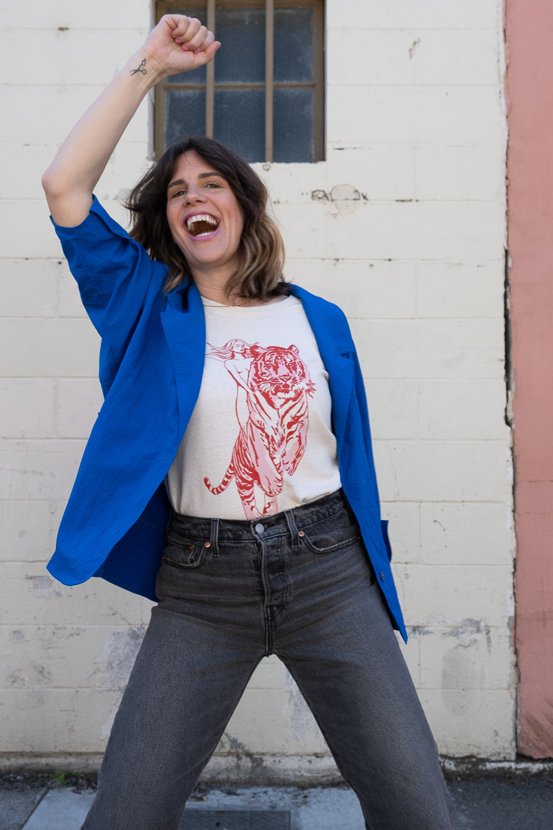 Untamed women's tee by Thread Hippie CA styled with blue blazer and black jeans.