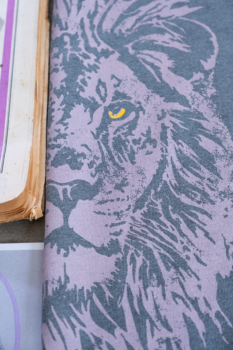 Detail photo of Thread Hippie's lion tshirt for women.
