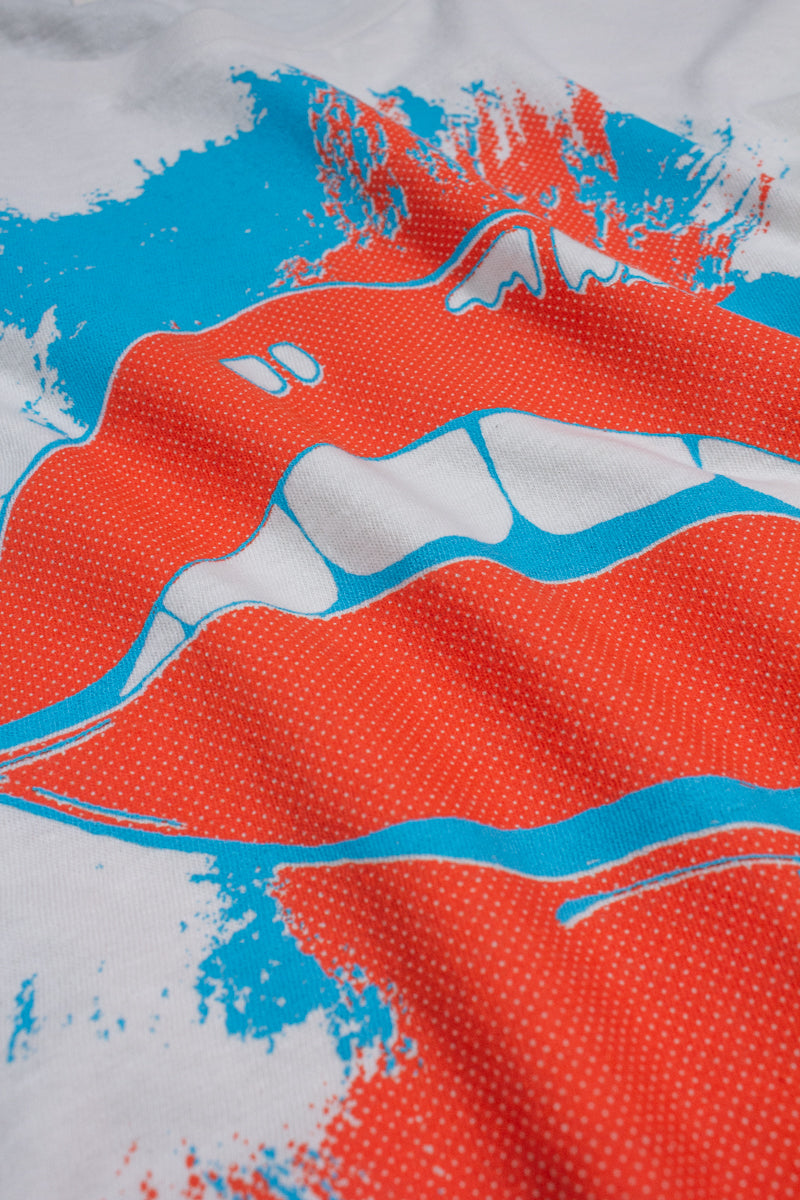 Close-up of pop art graphic design of red lips.