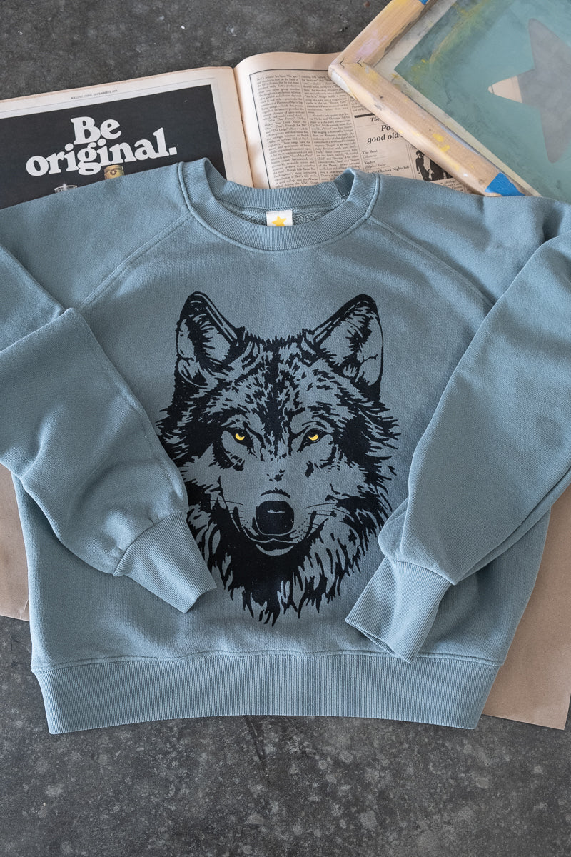 Thread Hippie green women's sweatshirt with wolf print.