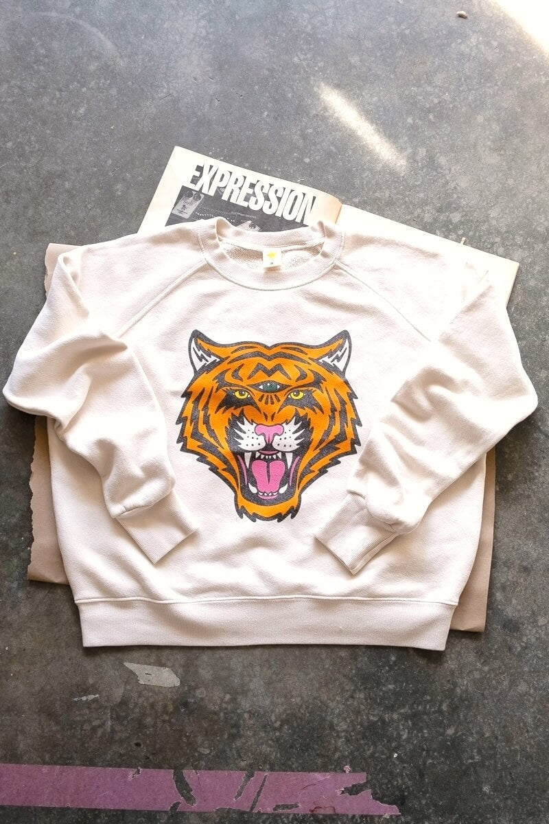 Flay lay image of Thread Hippie cosmic tiger sweatshirt.