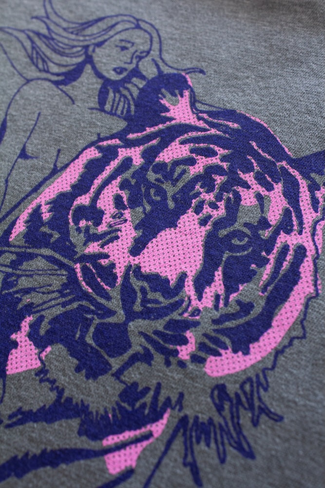 the "untamed" graphic tee on black