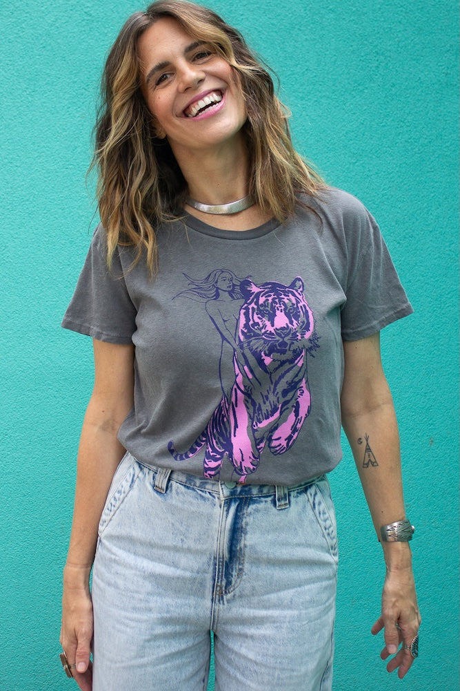 Angela wearing the Untamed women’s graphic t shirt in vintage black.