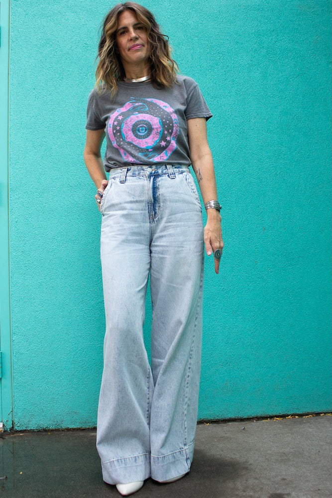 The Zodiac quality graphic tee in vintage black showing bright ink and print on posed model.
