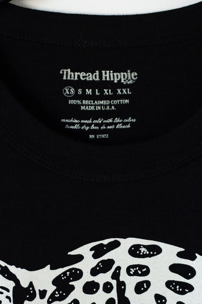 the "snow leopard II" graphic tee on black