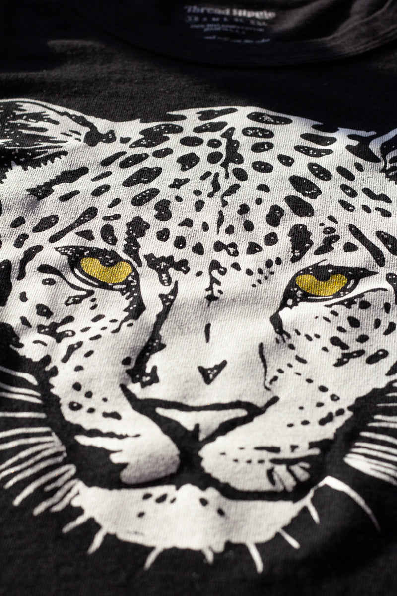 the "snow leopard II" graphic tee on black