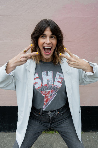 Thread Hippie She Energy women's graphic tee styled with white blazer.