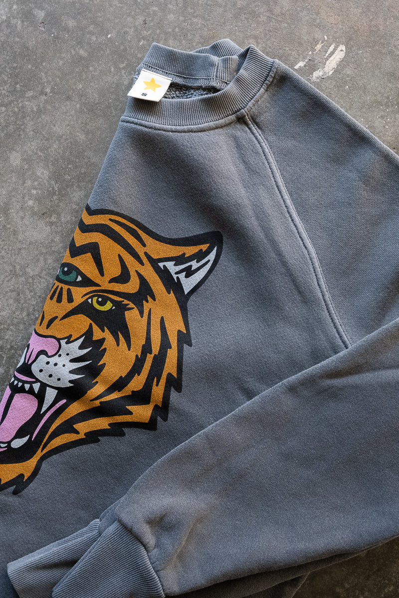 the "cosmic tiger" raglan sweatshirt on vintage black