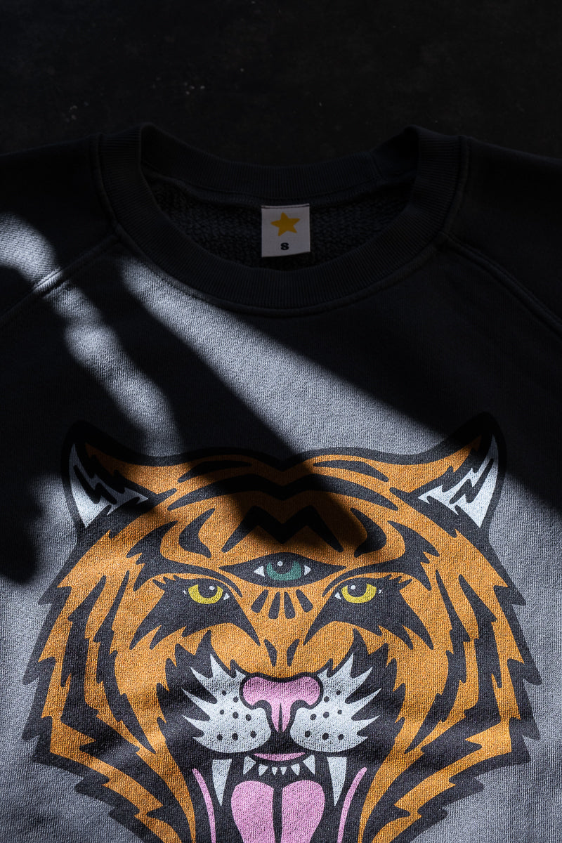 the "cosmic tiger" raglan sweatshirt on vintage black