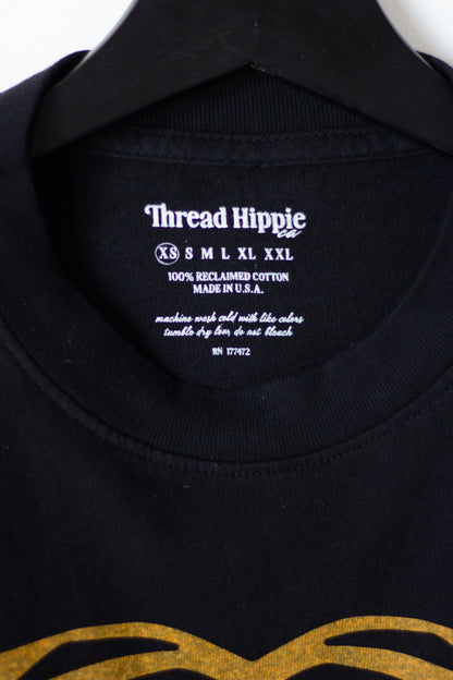 the "cosmic tiger II" graphic tee on black