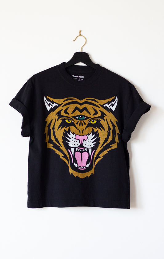 the "cosmic tiger II" graphic tee on black