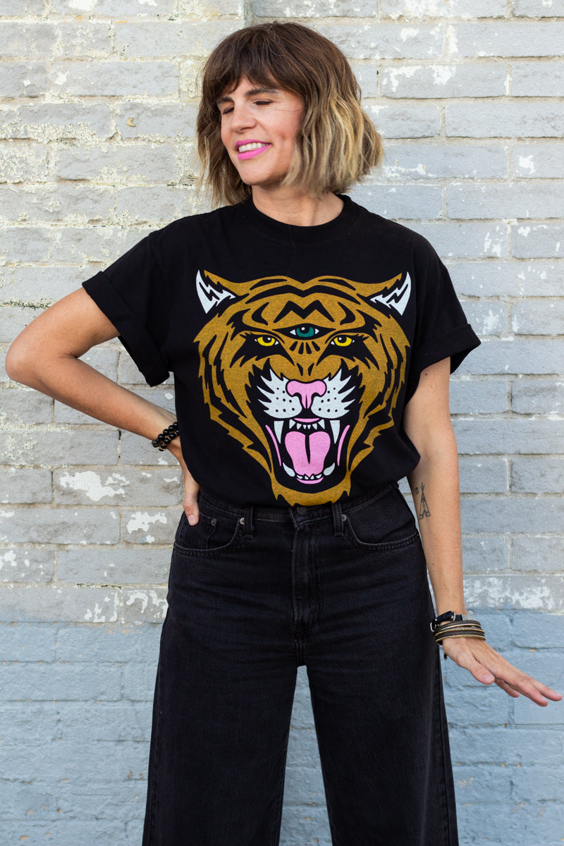 the "cosmic tiger II" graphic tee on black