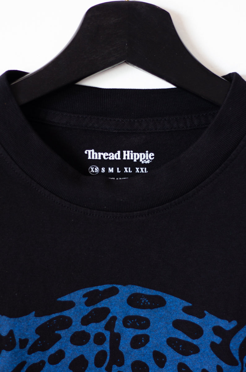 the "snow leopard III" graphic tee on black