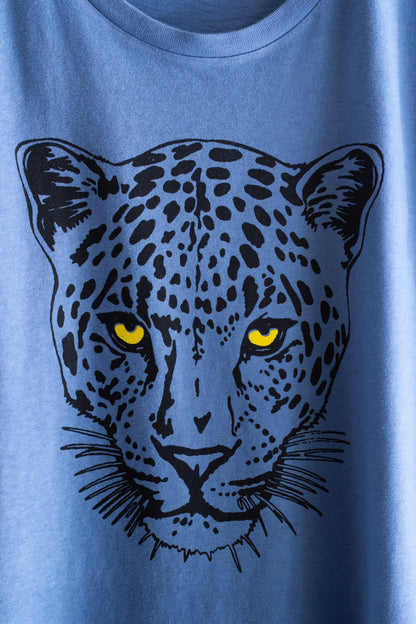 Blue women's t-shirt with a black leopard graphic on a plain background.
