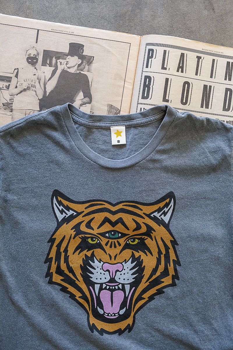 Women's Cosmic Tiger black boxy graphic tee details - front view.