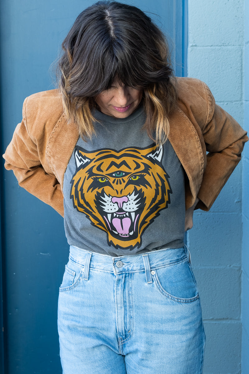 Women's Cosmic Tiger black boxy graphic tee styled on model - front view.