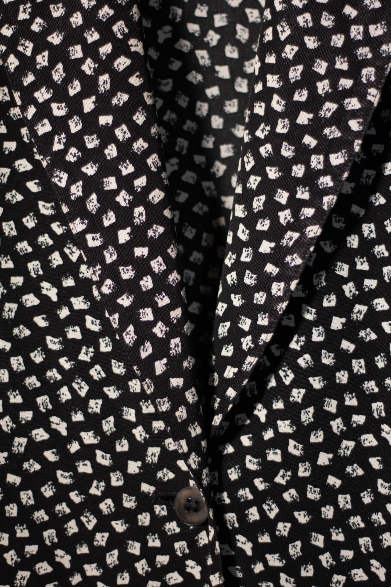 Black fabric with white geometric pattern