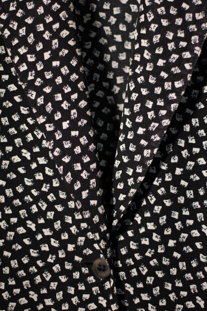 Black fabric with white geometric pattern