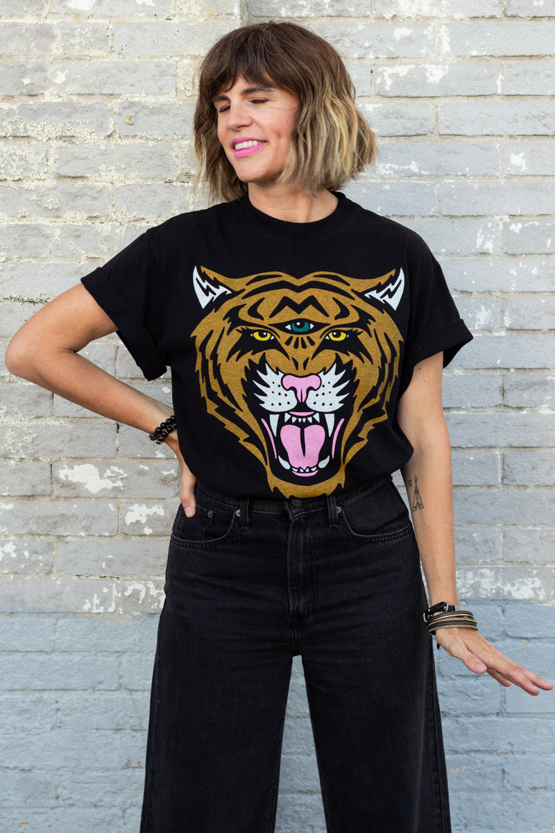 the "cosmic tiger II" graphic tee on black