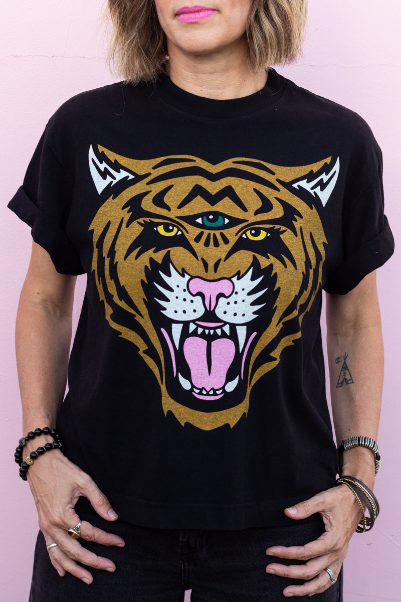 the "cosmic tiger II" graphic tee on black