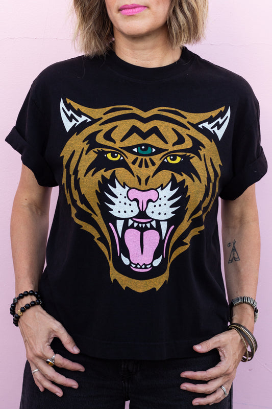 the "cosmic tiger II" graphic tee on black