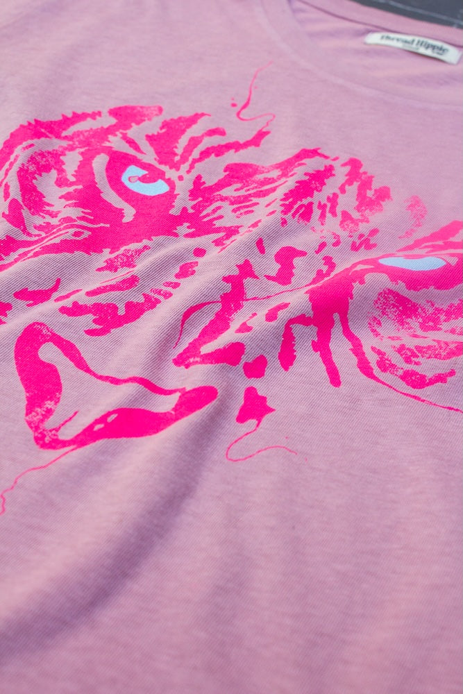 Detail photo of 1980s inspired tiger eyes tshirt.