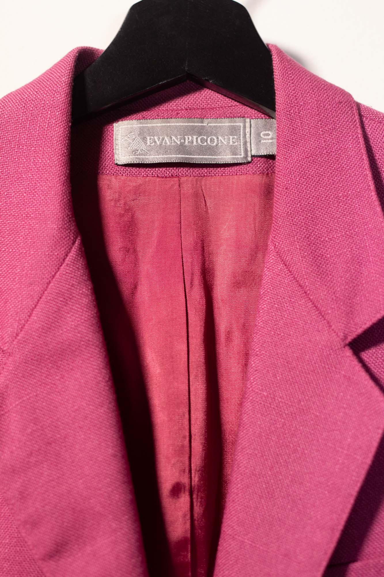 Pink blazer with 'Evan-Picone' label on a white background