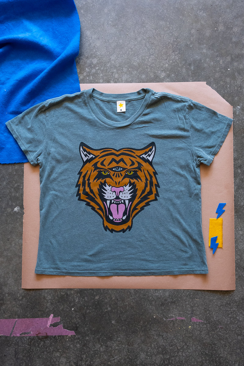 the "cosmic tiger" boxy tee on vintage green