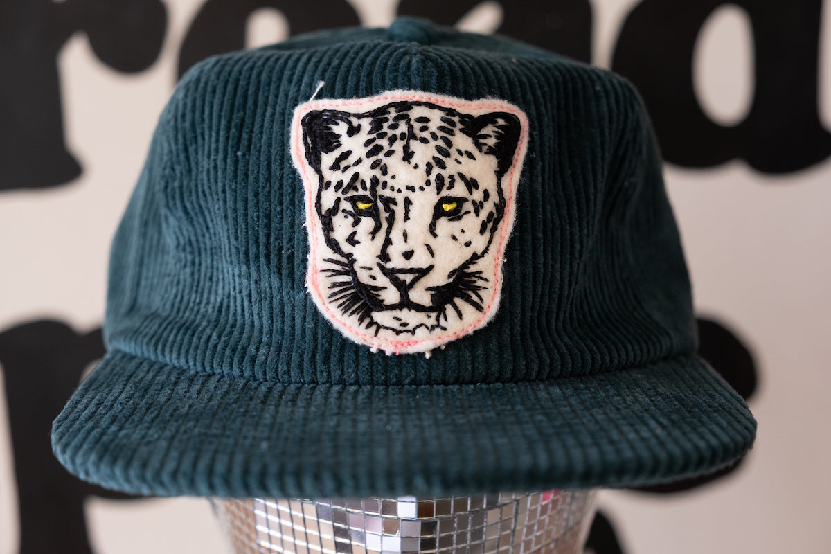 the "leopard" cap in green cord