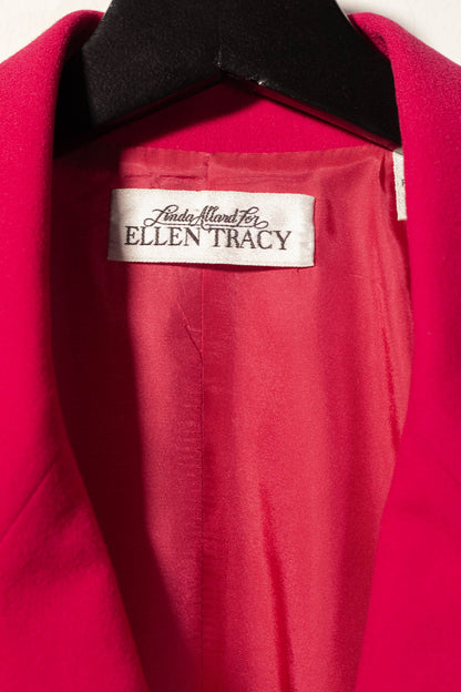 Red garment with an Ellen Tracy label on a hanger