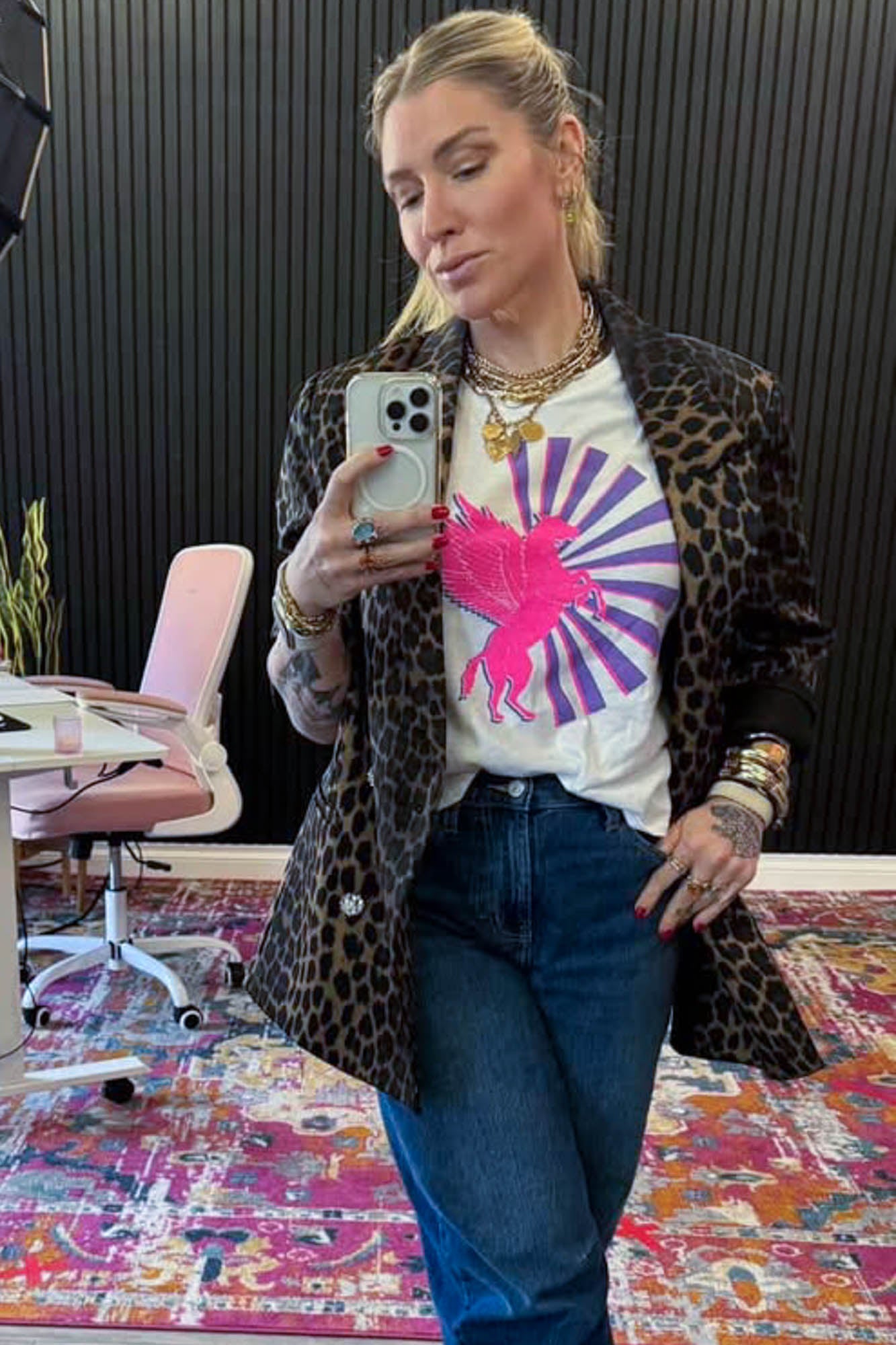 the "magic horse" graphic tee on white