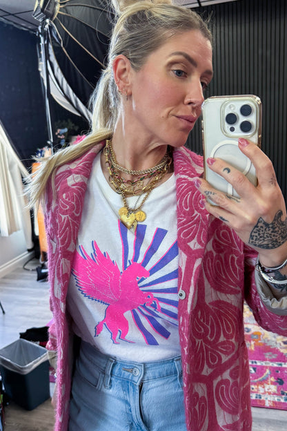 the "magic horse" graphic tee on white