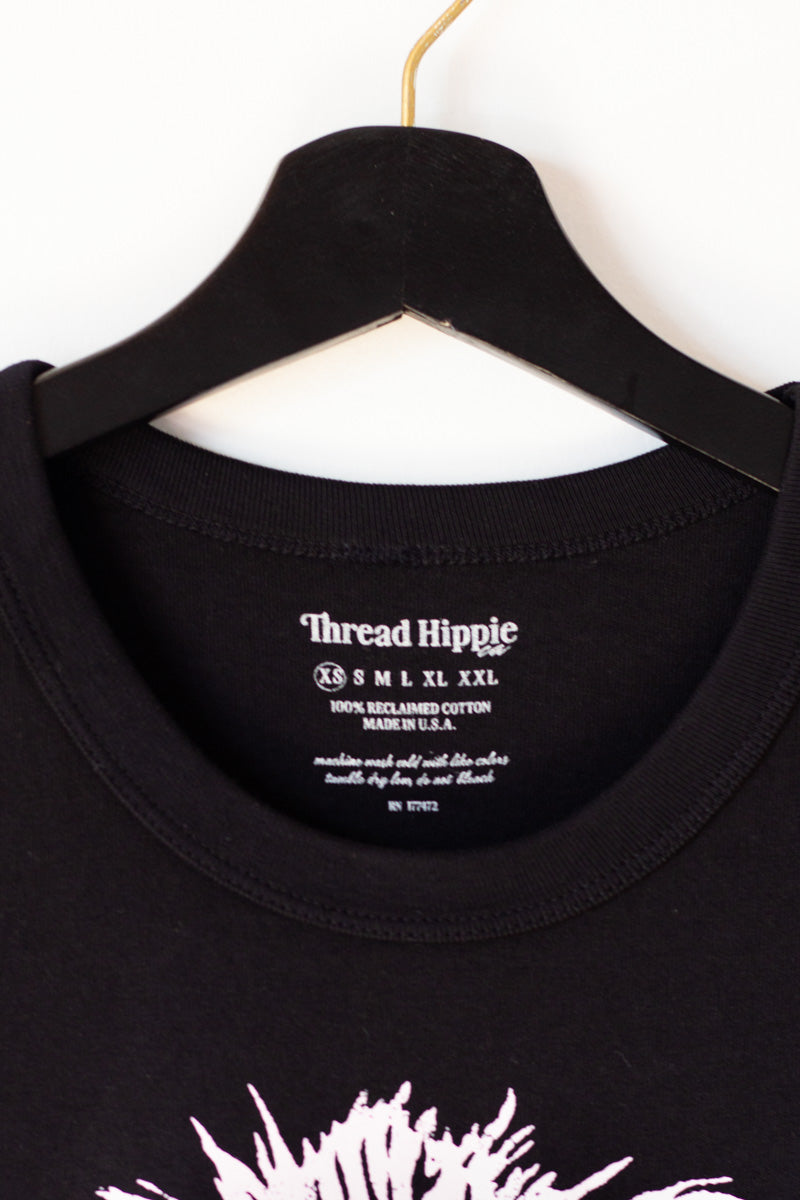 the "mane energy III" graphic tee on black