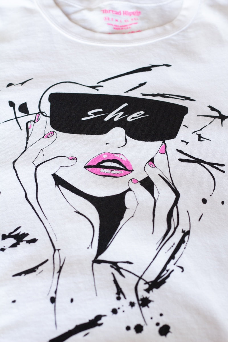 the "she energy II" graphic tee on white
