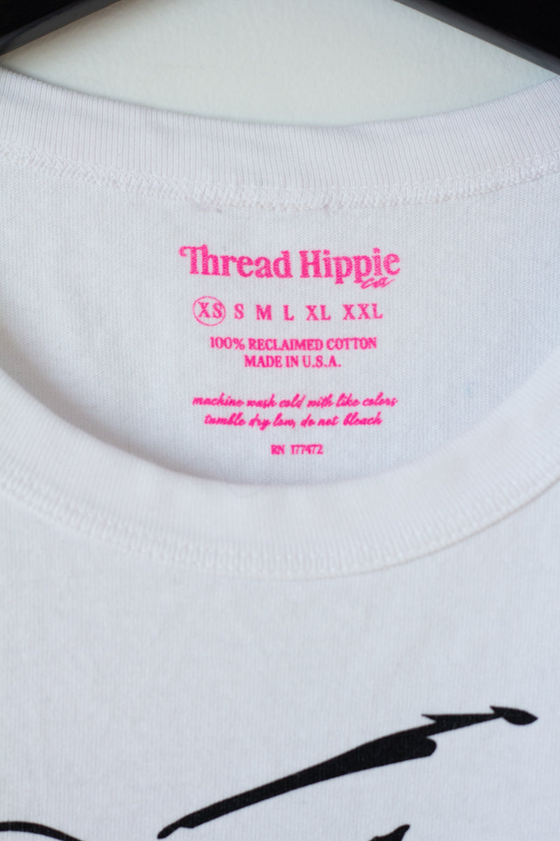 the "she energy II" graphic tee on white