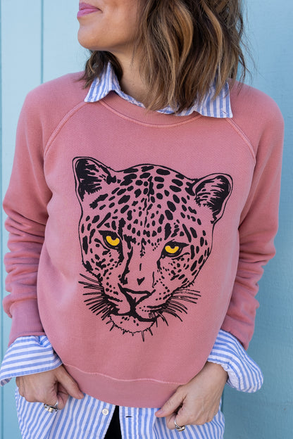 Detail photo of Thread Hippie women's leopard sweatshirt on pink.