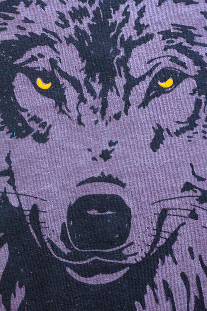 Close detail shot of wolf screen print on Thread Hippie woman's graphic tee.