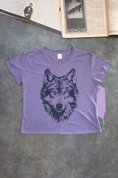 Flay lay photo of Thread Hippie woman's purple graphic tee.