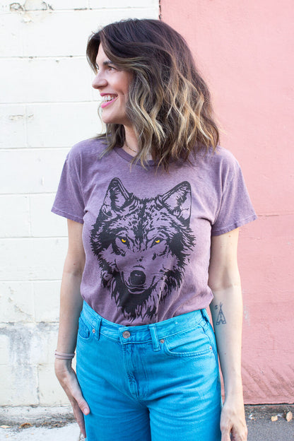 Thread Hippie's mother wolf screen printed on our faded vintage purple tee.
