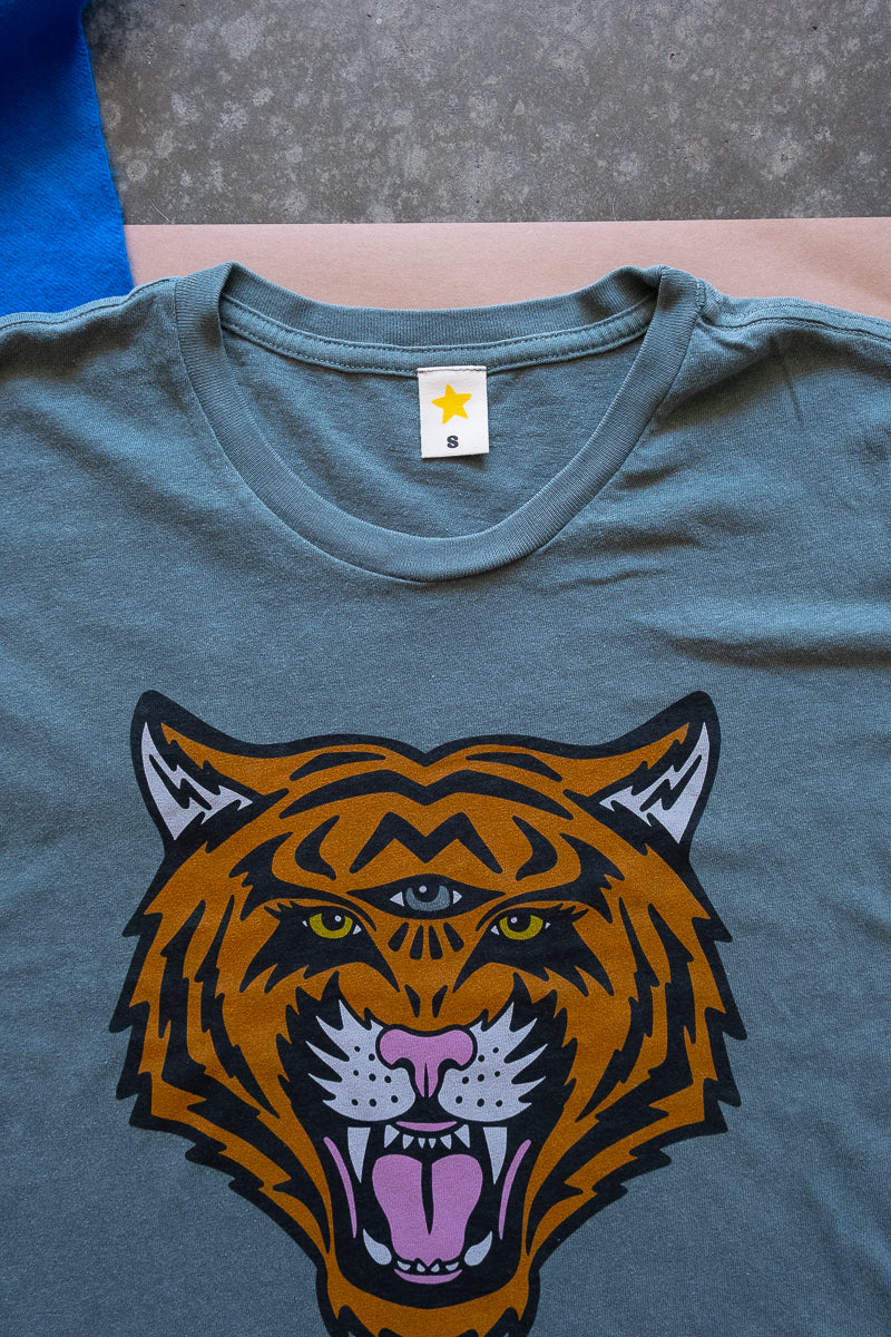 the "cosmic tiger" boxy tee on vintage green