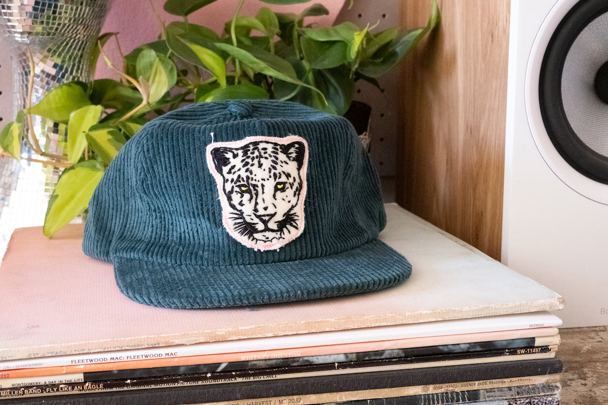 the "leopard" cap in green cord