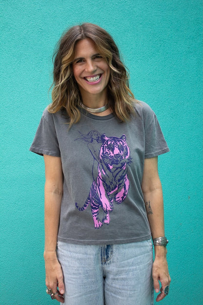 Angela wearing the Untamed cool women’s graphic t shirt in vintage black.