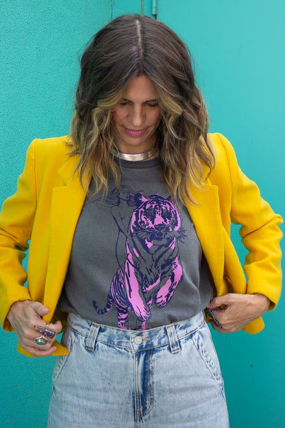 Untamed women’s designer graphic tee in vintage black styled with denim, yellow blazer and accessories.