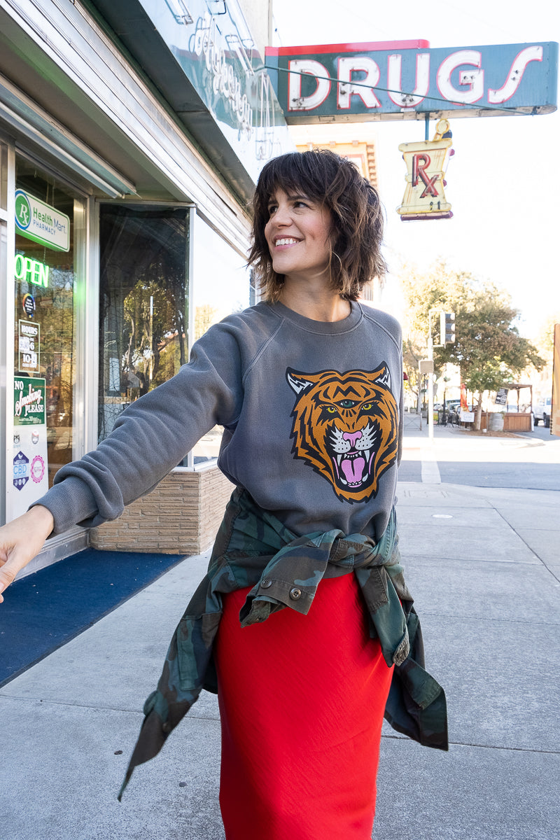 Women's Cosmic Tiger black sweatshirt in fashion street style photo.
