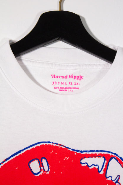 the "she says II" graphic tee on white