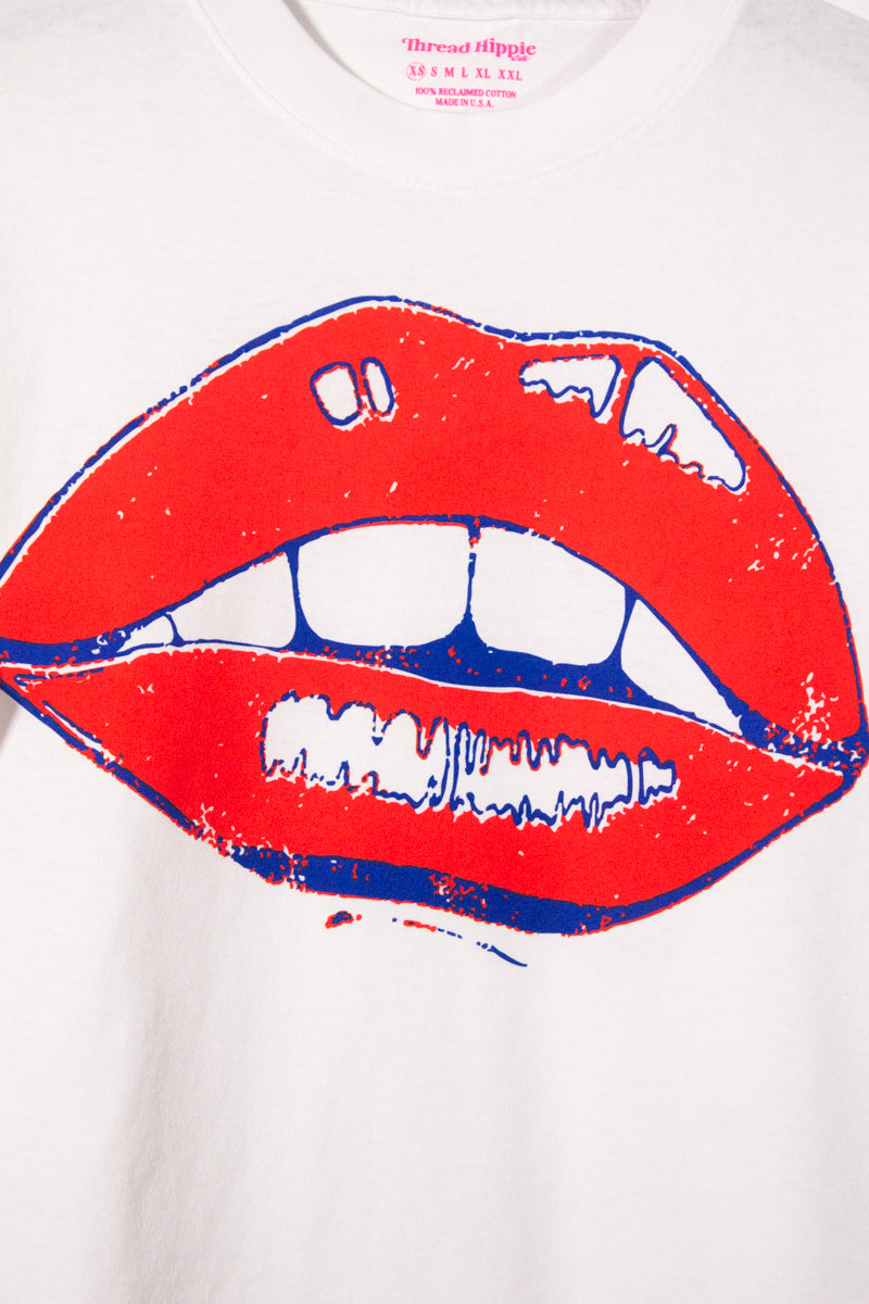 the "she says II" graphic tee on white