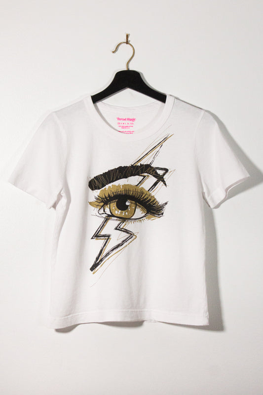 the "she's electric" graphic tee on white