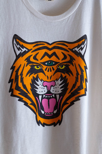 White women's graphic tee with a tiger graphic.